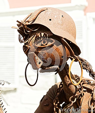 Rusty Iron Girl welded of iron scrap material Stock Photo