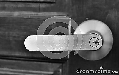 The part of wooden door with metal handle Stock Photo