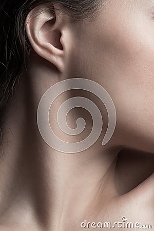 Part of young woman neck and face closeup natural beauty care concept Stock Photo