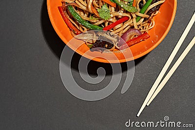 Partial of asian noodles in bowl and chopsticks Stock Photo