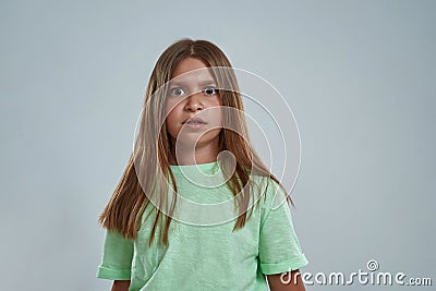 Partial of scared preschooler girl look at camera Stock Photo
