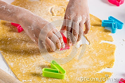 partial view of african american kid making cookies Stock Photo