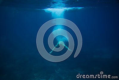 partial view of man diving into ocean Editorial Stock Photo