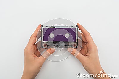 View of man holding purple cassette Stock Photo
