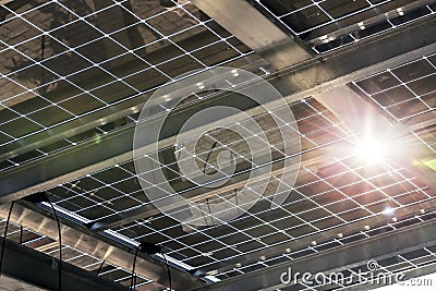 Partially transparent glass modules on carport Stock Photo