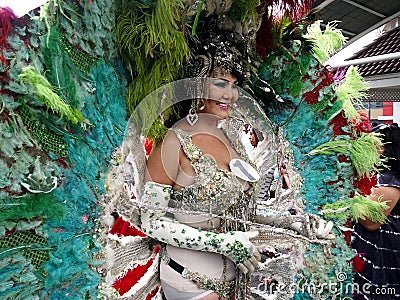 A participant in her colorful costume at a parade during the Sumaka Festival in Antipolo City. Editorial Stock Photo