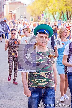 Participants in the column `Immortal Regiment` with portraits of the front artists Editorial Stock Photo