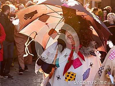 Participants of a costumed parade in the streets of Prague on witch burning night `carodejnice` Editorial Stock Photo