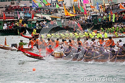Participants paddle their dragon boats Editorial Stock Photo