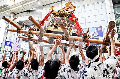 Participants of Tenjin Matsuri worships the golden shrine, July Editorial Stock Photo