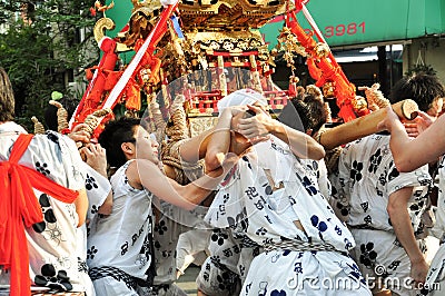 Participants of Tenjin Matsuri worships the golden shrine, July Editorial Stock Photo