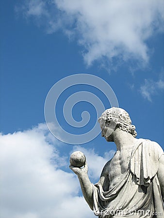 Detail of a marble sculpture of a man with a globe in SchÃ¶nbrunn in Vienna Editorial Stock Photo