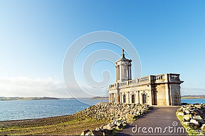 Partly submerged church Stock Photo