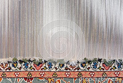 Partly woven carpet Stock Photo