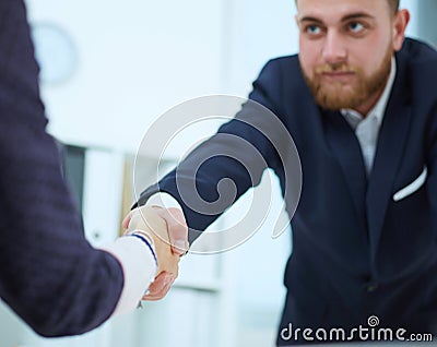 Partners made deal and sealed it with handclasp. Stock Photo