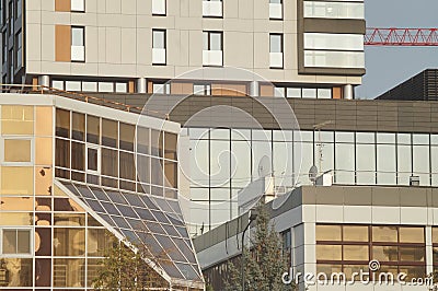 Parts of facades of multi-storey buildings. New buildings. Stock Photo