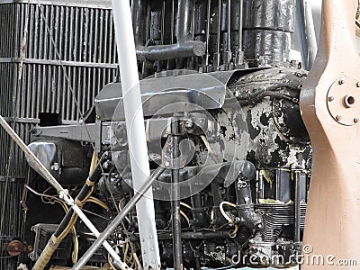 Parts of the old aircraft engine. Nuts connecting tubes, nozzles, cylinders, insulation of the combustion chamber Stock Photo