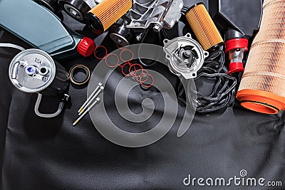 Parts for scheduled car maintenance.Oil , air , fuel filter, Water pumps motor, belt car engine for car - Image Stock Photo