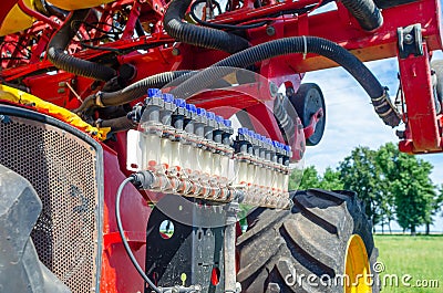 Parts of tractor seeder mechanisms. Close-up of details of agricultural machinery Stock Photo