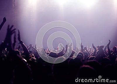 Party audience or concert crowd in violet Stock Photo