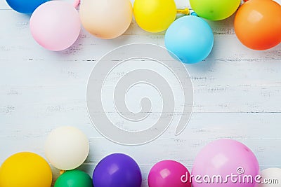 Party or birthday banner with colorful balloons on blue wooden background top view. Flat lay style. Stock Photo