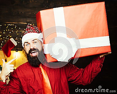 Party Christmas. Gift text copy space. Funny Santa Claus. Christmas Santa claus with gift. Christmas sale. Stock Photo