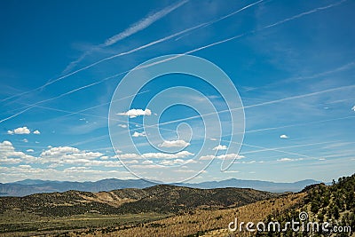 Party Clouds with Contrails Stock Photo