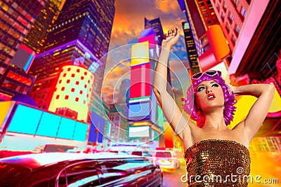 Party girl pink wig dancing in Times Square of NYC Stock Photo