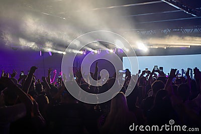 Party lights and crowds of young people. Editorial Stock Photo