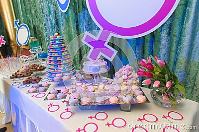 Party with macaroon tower and cakes Stock Photo