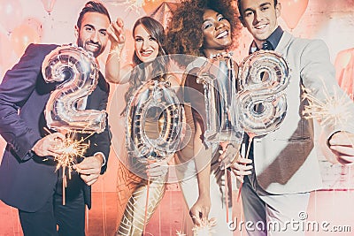 Party people women and men celebrating new years eve 2018 Stock Photo