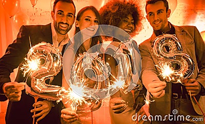 Party people women and men celebrating new years eve 2018 Stock Photo