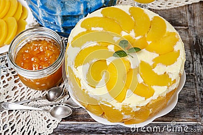 Party table with peach cheese cake Stock Photo