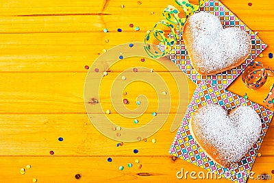 Party time with romantic heart shaped donuts Stock Photo