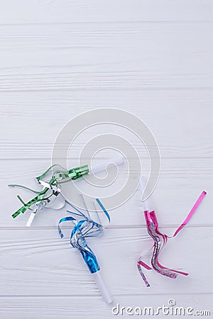 Party whistles and streamers with copy space. Stock Photo