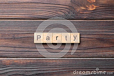 PARTY word written on wood block. PARTY text on cement table for your desing, concept Stock Photo