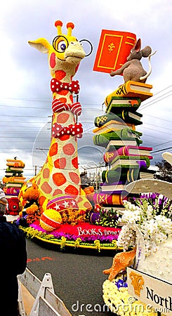 Pasadena, California 2017 Tournament of Roses Parade float `Mouse Teaching The Nearsighted Giraffe To Read` * January 2, 2017 Editorial Stock Photo