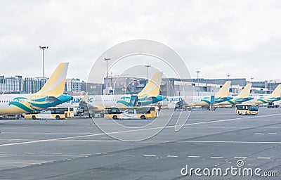 Pasay, Metro Manila, Philippines - A fleet of Cebu Pacific airplanes, mostly Airbus A320s, at NAIA Terminal 3 Editorial Stock Photo