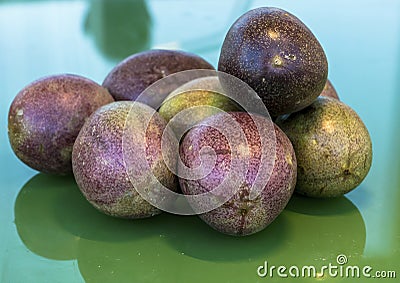 Pasiflora fruits on glass table Stock Photo