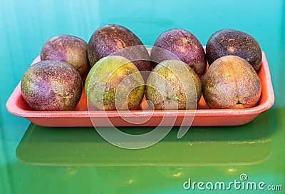 Pasiflora fruits on plastic tray Stock Photo