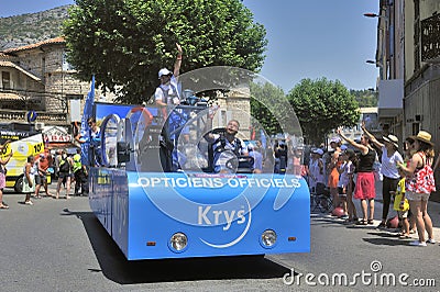 Passage of an advertising car of opticians Krys in the caravan of the Tour de France Editorial Stock Photo