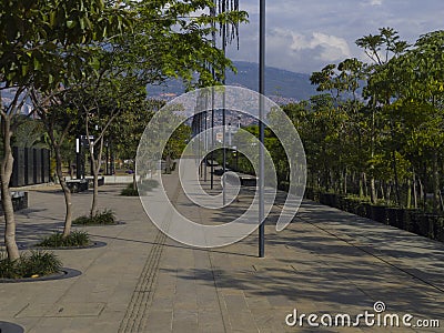 Passage to walk in Medellin river parks with summer sun Editorial Stock Photo