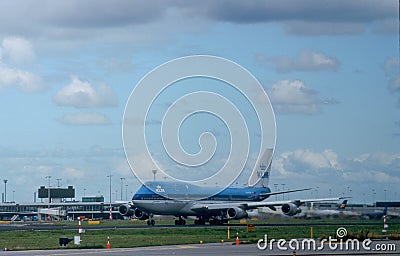 Passenger aircraft at Schiphol Airport Editorial Stock Photo