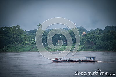 Passenger boats are ferrying between Thailand and Laos on the Mekong River. in Nakhon Phanom Editorial Stock Photo