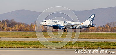 Passenger jet aircraft Airbus A319 of Aurora Airlines takes off. Aviation and transportation Editorial Stock Photo