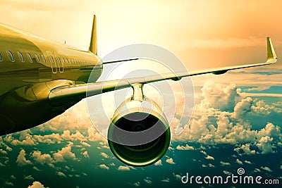 passenger jet plane flyin above cloud scape use for aircraft transportation and traveling business background Stock Photo