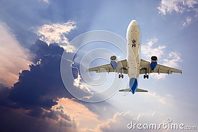 Passenger jet plane flying in the sky Stock Photo