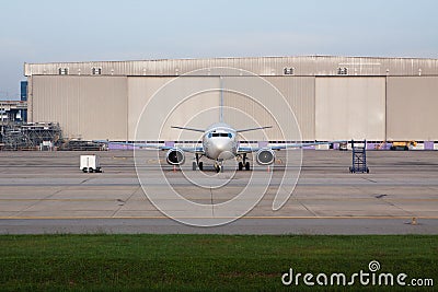 Passenger jet plane parking on taxi way Stock Photo