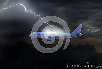 plane flies into a thunderstorm and is struck by lightning Stock Photo