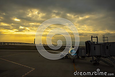 Passenger plane preparing for departure from airport terminal ea Stock Photo